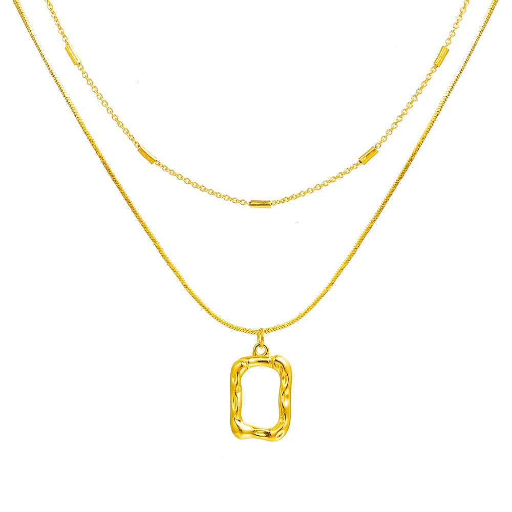 Mix of Abstract Pendant Necklaces Plated in 18K Gold