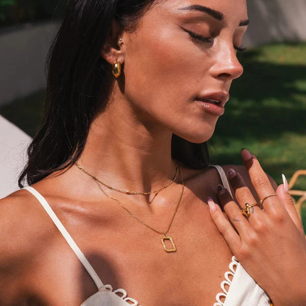 Mix of Abstract Pendant Necklaces Plated in 18K Gold