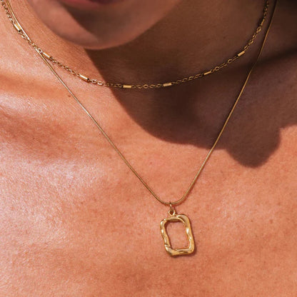 Mix of Abstract Pendant Necklaces Plated in 18K Gold